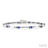 5x3 MM Oval Cut Tanzanite and 1/10 Ctw Bar and Oval Mount Round Cut Diamond Precious Bracelet in 10K White Gold