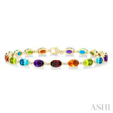 6X4 MM Oval Cut Multiple Gemstone and 1/6 Ctw Round Cut Diamond Semi-Precious Tennis Bracelet in 10K Yellow Gold