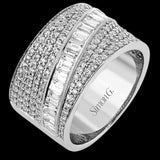 18K white gold wide right hand diamond ring 2.0 ctw., boasts multiple rows of RD diamonds 0.92 ctw, and a diagonal row of baguettes 1.08 ctw.