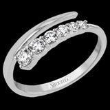 This dynamic 18k gold ring adds the perfect accent to any outfit with .38 ctw of diamonds in a graduated line.
