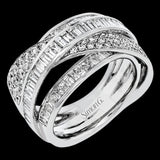 Bold and modern, this 18k white gold ring contains 1.11 ctw of baguette diamonds and .48 ctw of round diamonds set into a dynamic, overlapping design.