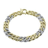 Make a statement with this 14K two-tone cuban link bracelet of yellow gold and white gold diamond links 0.75 ctw., in a stylish Men's bracelet 8