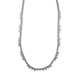 This elegant 18K white gold diamond necklace stuns with a mix of round diamonds 1.84 ctw. and sections of pear shaped diamonds 3.52 ctw. creating a sophisticted edgy look