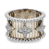 Make a statement in this fashion ring with 18K strands of rose gold adorned with .30 ctw diamonds inside a flower pattern, and white gold beaded edge