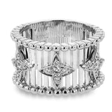 Make a statement in this fashion ring with 18K strands of rose gold adorned with .30 ctw diamonds inside a flower pattern, and white gold beaded edge