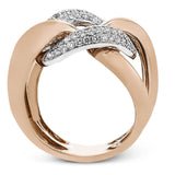 A modern take on the love knot this right hand ring in 18K yellow and white gold, features interlocking links of high polish gold and a diamond link 0.79 ctw.