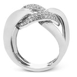 A modern take on the love knot this right hand ring in 18K yellow and white gold, features interlocking links of high polish gold and a diamond link 0.79 ctw.
