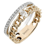 This modern right hand ring from our chain link collection, combines two looks & features a 0.21 ctw oval diamond set in yellow gold links, lined by a white gold band of RD diamonds 0.20 ctw.