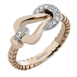 18K two-tone right hand ring from the SG buckle collection, has a diamond collar and latch 0.10 ctw with milgrain edge.
