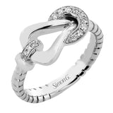 18K two-tone right hand ring from the SG buckle collection, has a diamond collar and latch 0.10 ctw with milgrain edge.