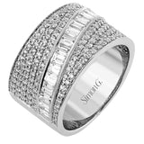 18K white gold wide right hand diamond ring 2.0 ctw., boasts multiple rows of RD diamonds 0.92 ctw, and a diagonal row of baguettes 1.08 ctw.