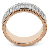 This two-tone right hand ring has a ribbed yellow gold band and sparkles with a row of baguette diamonds 1.0.7 ctw, accented by a delicate white gold beaded channel.