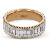 This two-tone right hand ring has a ribbed yellow gold band and sparkles with a row of baguette diamonds 1.0.7 ctw, accented by a delicate white gold beaded channel.