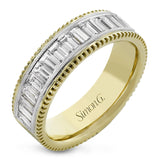 This two-tone right hand ring has a ribbed yellow gold band and sparkles with a row of baguette diamonds 1.0.7 ctw, accented by a delicate white gold beaded channel.