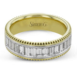 This two-tone right hand ring has a ribbed yellow gold band and sparkles with a row of baguette diamonds 1.0.7 ctw, accented by a delicate white gold beaded channel.
