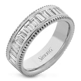 This two-tone right hand ring has a ribbed yellow gold band and sparkles with a row of baguette diamonds 1.0.7 ctw, accented by a delicate white gold beaded channel.