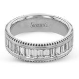 This two-tone right hand ring has a ribbed yellow gold band and sparkles with a row of baguette diamonds 1.0.7 ctw, accented by a delicate white gold beaded channel.