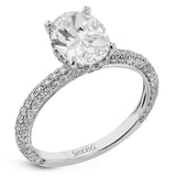 This stunning engagement ring  from our under halo collection is made for an oval center diamond, and set with 0.80 ctw of pave set diamonds in 18 kt white gold.