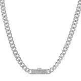 A sylish  gold curb link necklace dazzles with 5.64 ctw. Of diamonds and a diamond encrusted box lock, 20
