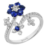 18K white gold floral inspired right hand ring with flowers of sapphires 0.80 ct., and diamonds 0.75 ctw.