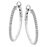 These classic diamond hoops in 18K white gold, sparkle with a half carat of diamonds and a secure hinge closure.