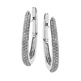 A modern take on the classic hoops, these elongated u-shaped earrings in 18K white gold have 3 sides of pave set diamonds 1.34 ctw., and a secure hinged latch closure