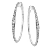 A fresh take on the diamond hoops in 18K white gold 1.11 ctw, they taper at the ends and feature larger diamonds in the center graduating to small towards the ends.