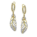 The perfect accessory for fall, these 18K yellow gold earrings inspired by nature feature .54ct of natural white diamonds.