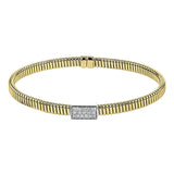 18k Yellow gold textured bangle is highlighted by .25 ctw of diamonds set in a rectangular design. Perfect for stacking