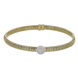 18K Yellow gold textured bangle with round diamond accent .20 ctw. and magnetic closure, is a perfect bangle for stacking