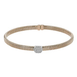 This modern design 18k rose gold textured bangle with .19ctw diamonds set in a cushion shape and magnetic closure, is perfect for stacking