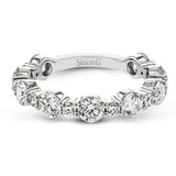 This brilliant diamond ring 2.07 ctw. in 18K white gold doubles as a wedding band and a stackable band, with a unique bubble design of alternating large and small round diamonds