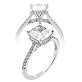 This 18K engagement ring from our under halo collection evokes understated elegance, with 0.30 ctw of delicate diamonds on the shank, the lower halo, and the bridge.