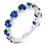 The perfect addition to any stack or bold enough to stand alone, this 18K white gold band showcases 1.69cttw oval sapphires and .35cttw diamonds.