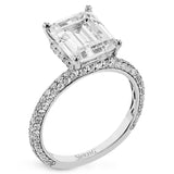 This stunning engagement ring from our under halo collection is set with 0.80 ctw of pave set diamonds in 18 kt white gold.