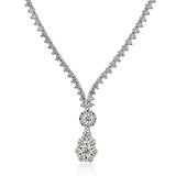 A classic statement, this 18k white gold necklace featuring 4.55cttw diamonds adds the perfect amount of sparkle.