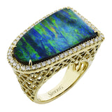 This unique right hand ring features a 14.3 ct. australian opal with a halo of diamonds 0.39 ctw., on an intricate basketweave setting of 18K yellow gold