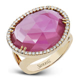 PINK POWER.  THIS 18K ROSE GOLD RING FEATURING A 14.88CT PINK TOURMALINE SURROUNDED BY .39CTTW DIAMONDS