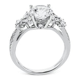A beautiful engagement ring perfect for those who love floral inspired designs. It features a split shank setting with diamond accents .20ctw., & 8 pear shaped diamonds .62ctw. that create the look of petals around the center stone.