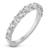 The perfect compliment to your ring, this simple & elegant 18 kt white gold diamond band has 1.10 ctw of round brilliant white diamonds