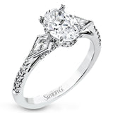 This modern 3 stone engagement ring is made for an oval center and flanked by 2 kite set diamonds 0.23 ctw, with round prong set diamonds along the shank 0.22 ctw.