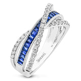 This 18K white gold right hand ring is the perfect twist on a classic design and features .73cttw sapphires and .43cttw diamonds.