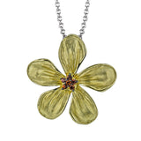 18K two tone gold textured flower pendant has a cluster of white diamonds in it's center 0.04 ctw on a white gold chain