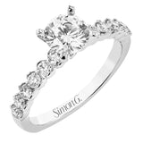 18K diamond engagement ring 0.50 ctw., features a half bezel setting on each individual side diamond which adds a modern bubble look to this ring