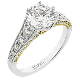 This cathedral style engagement ring features milgrain detail and sparkles with 0.48 ctw of white diamonds and 0.28 ctw of natural yellow diamonds