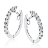 Our beautiful white gold 1/2 carat diamond hoop earrings are prong set with .47 ctw of diamonds