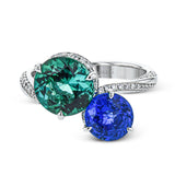 Double with fun with this dynamic duo of exquisite cool-toned gems in this 18k white gold ring: A 1.57 ct blue sapphire and a 2.43 green tourmaline.