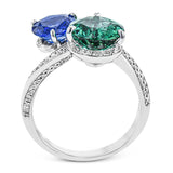 Double with fun with this dynamic duo of exquisite cool-toned gems in this 18k white gold ring: A 1.57 ct blue sapphire and a 2.43 green tourmaline.