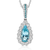 This gorgeous white gold pendant features a pear shaped paraiba tourmaline center 1.54 ctw, surrounded by a scalloped halo of diamonds 0.46 ctw, and a sprinkling of round paraibas 0.07 tw. on the bail.
