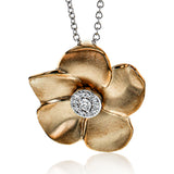 A Lustrous yellow gold flower pendant with 0.07 ct.white diam on 18 white gold chain